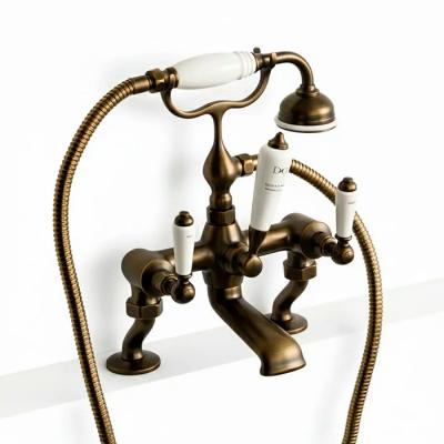 Фото Devon Dandy Смеситель для ванны, монтаж на бортик ванны, с лейкой и шлангом, цвет:бронза